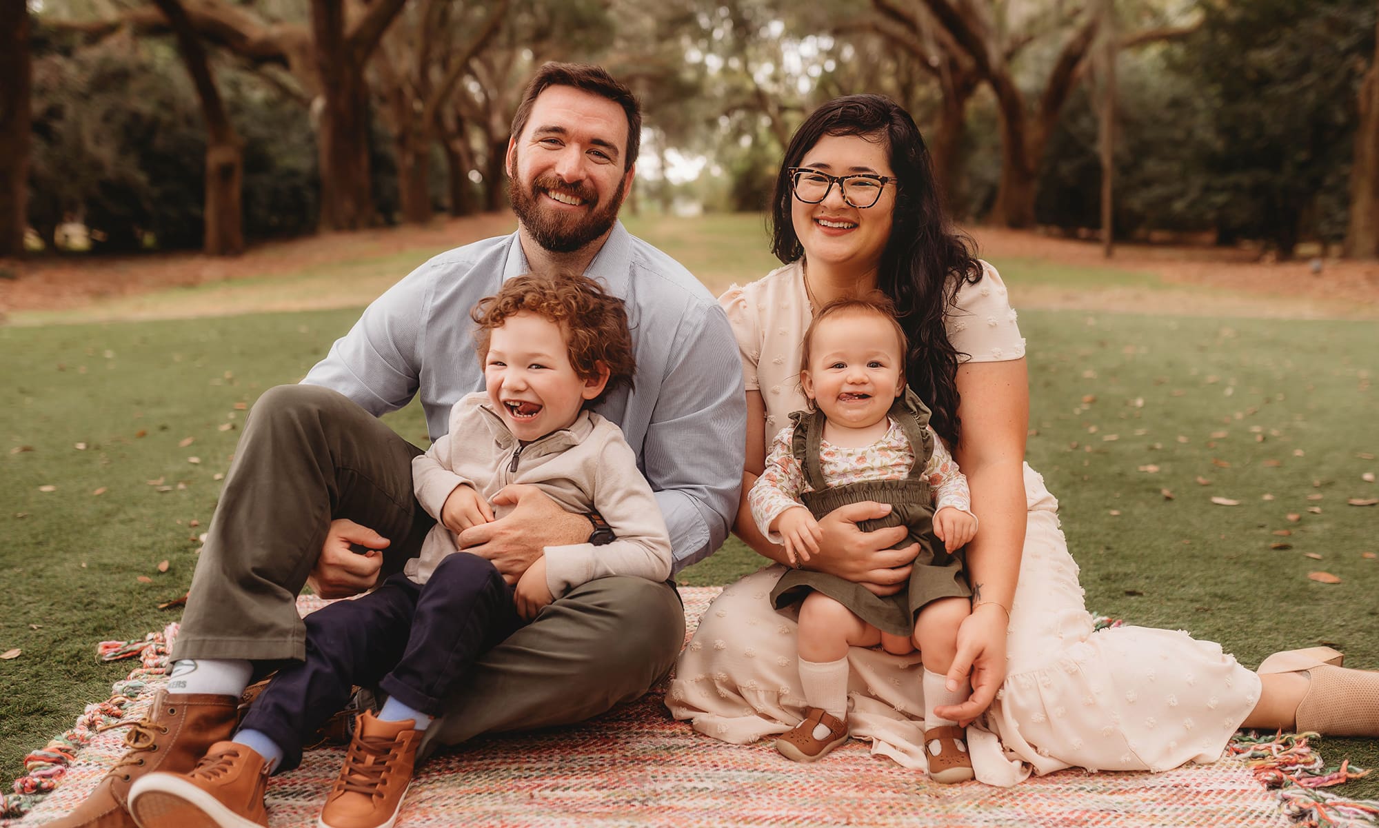 Family poses for Fall Mini Session at Charles Town Landing in Charleston, SC.