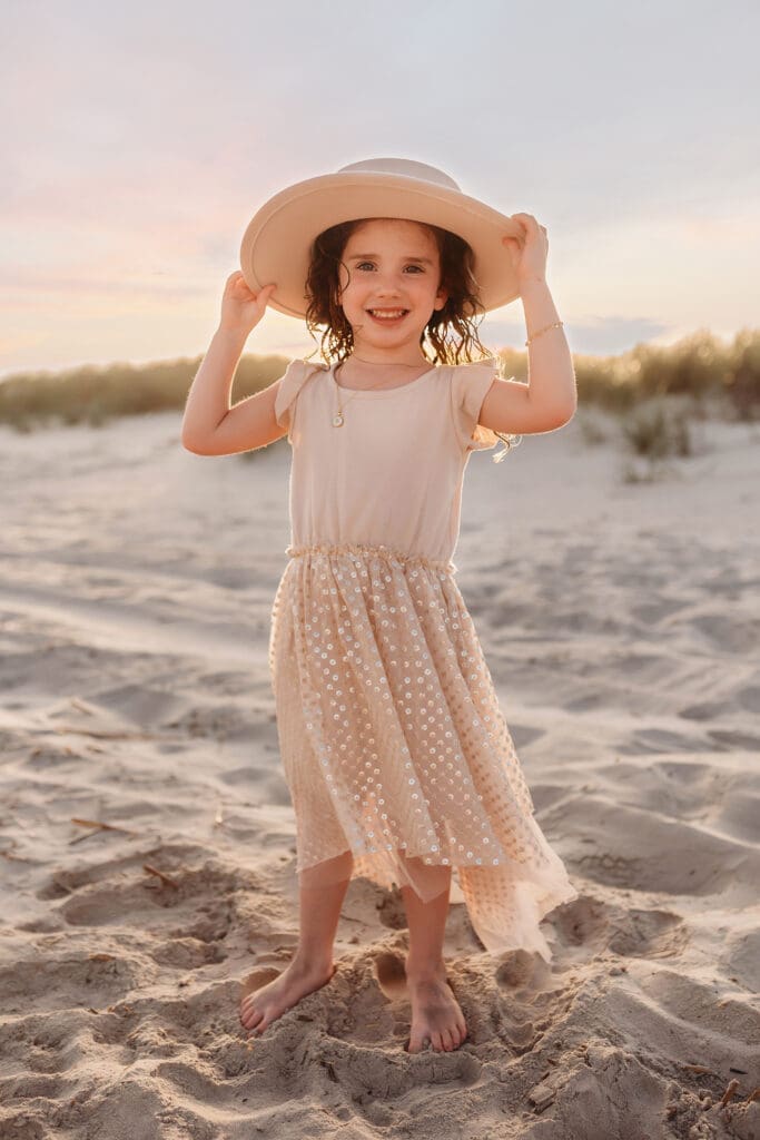 Little girl smiles at the camera during Family Pictures on Kiawah Island with Holy City Family Photography.