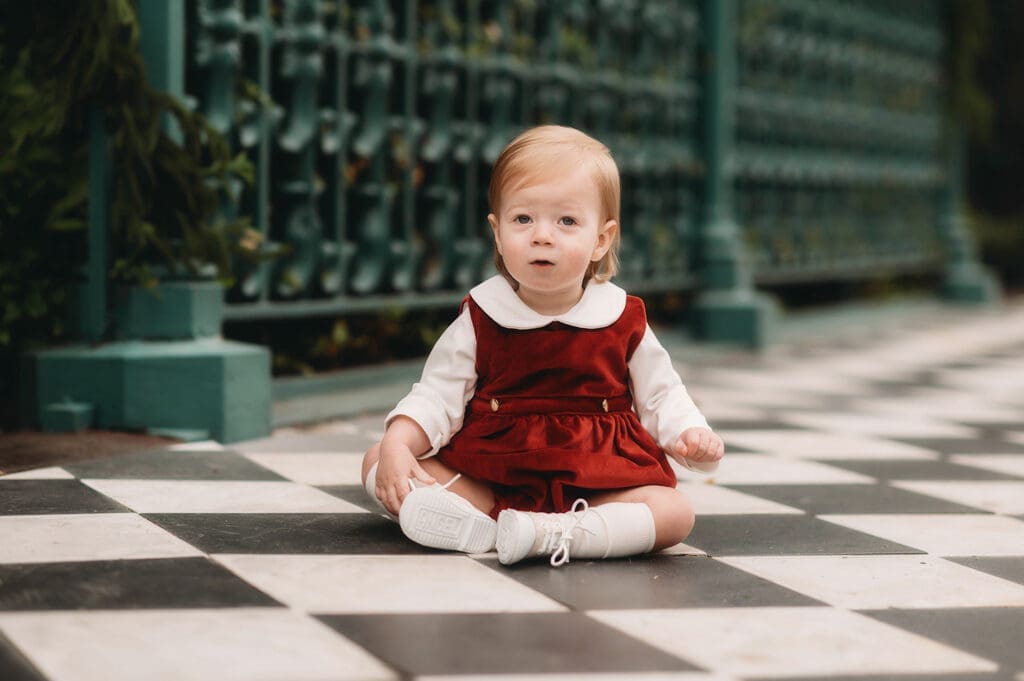 Baby posed for Holiday Mini Sessions in Downtown Charleston, SC. 