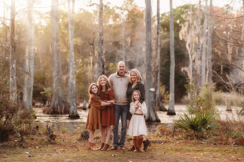 Family poses together during Fall Mini Session in Charleston, SC after learning about Charleston Mini Sessions from Holy City Family Photography. 