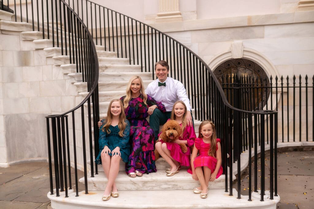 Family posed for Holiday Mini Sessions in Downtown Charleston, SC. 