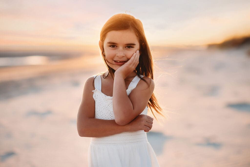 Little girl smiles at the camera during Family Pictures on Kiawah Island after reading about the Best Restaurants on Kiawah Island with Kids on Holy City Families Blog! 